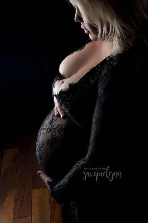 Tucson indoor maternity boudoir photos pregnant woman wearing lace body suit